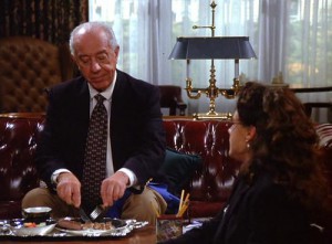 ian_abercrombie_as_mr_pitt_in_seinfeld_eating_chocolate_bar_with_a_fork_and_knife