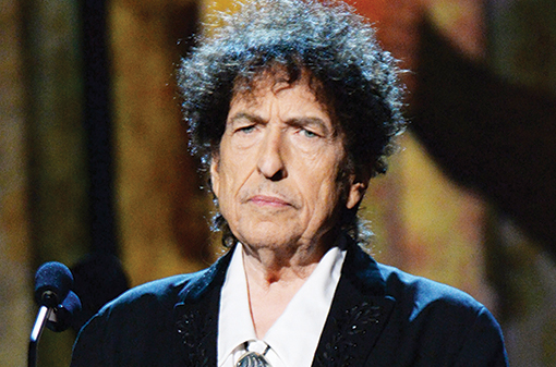 LOS ANGELES, CA - FEBRUARY 06: Bob Dylan speaks onstage at the 25th anniversary MusiCares 2015 Person Of The Year Gala honoring Bob Dylan at the Los Angeles Convention Center on February 6, 2015 in Los Angeles, California. The annual benefit raises critical funds for MusiCares' Emergency Financial Assistance and Addiction Recovery programs. For more information visit musicares.org. (Photo by Kevin Mazur/WireImage)