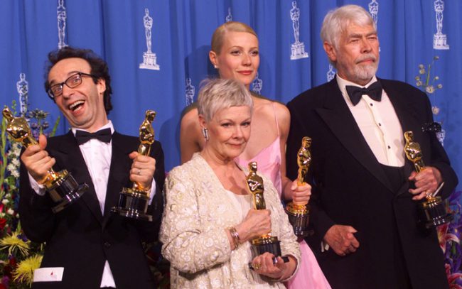 From left to right, Roberto Benigni for best actor in "Life Is Beautiful," Judi Dench winner for best supporting actress in "Shakespeare In Love," Gwyneth Paltrow winner for best actress for her role in "Shakespeare In Love," and James Coburn winner for best supporting actor for "Affliction," all pose for a photo with their Oscars during the 71st Annual Academy Awards at the Dorothy Chandler Pavilion of the Los Angeles Music Center, Sunday, March 21, 1999. (AP Photo/Dave Caulkin)